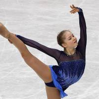 Teen sensation: Russia\'s Julia Lipnitskaia competes at the world championships in Saitama on Thursday. | REUTERS