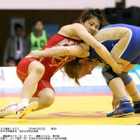 Simply the best: Saori Yoshida (left) competes at the women\'s wrestling World Cup in Tokyo on Sunday. | KYODO