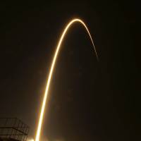 This long-exposure photograph courtesy of NASA shows the flight path of the Soyuz TMA-12M rocket as it launches from the Baikonur Cosmodrome in Kazakhstan early Wednesday. The rocket, carrying Russians Alexander Skvortsov and Oleg Artemyev and American Steve Swanson, blasted off successfully early Wednesday, but an engine snag was expected to delay the arrival of the Russian spacecraft at the International Space Station until Thursday. | REUTERS