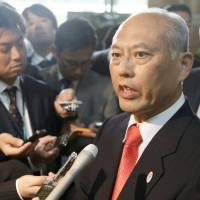 Tokyo Gov. Yoichi Masuzoe speaks to the press in Tokyo after his recent trip to Beijing.  | KYODO