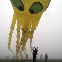 An octopus-shaped kite plies the smog in Chongqing, China, on April 6. | REUTERS
