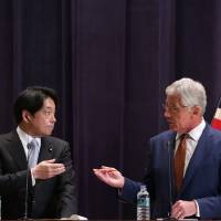 Defense Minister Itsunori Onodera and U.S. Defense Secretary Chuck Hagel hold a joint news conference Sunday in Tokyo. Two Aegis ships bound for Japan