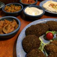 Milk and honey: The all-you-can-eat dinner at Shamaim includes Israeli staples hummus, falafel and chicken schnitzel. Pining for the communal flavor of Israeli cuisine