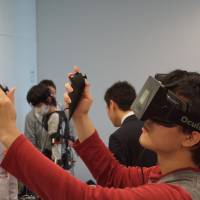Brave new world: Curious game fans got a glimpse of the future at OcuFes, an Osaka event dedicated to Oculus Rift, which is a virtual-reality headset newly acquired by Facebook. Japanese game developers create immersive virtual worlds with Oculus Rift
