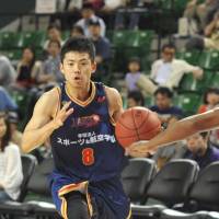 Distraction: Akitomo Takeno (8) and his Rizing Fukuoka teammates have won 14 of their past 20 games. The team\'s president was arrested Saturday for suspected embezzlement. | YOSHIAKI MIURA