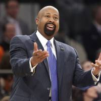 Jackson starts house cleaning with Knicks by firing Woodson