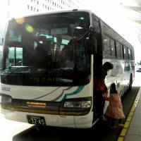 Passengers exit a Centrair Limousine bus after arriving at Chubu Centrair International Airport in Nagoya. The bus transports travelers between the airport, situated in Tokoname on a man-made island in Ise Bay, and local hotels in the center of the city. Chubu airport retools to attract foreign tourists