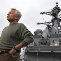 U.S. Secretary of Defense Chuck Hagel answers questions aboard the USS Stethem at Fleet Activities Yokosuka, a U.S. Navy base in Yokosuka, Kanagawa Prefecture, on Oct. 4, 2013. | AP