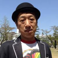 Shinya Yamagata, chief representative of the upcoming Tokyo Rainbow Pride, poses for a photo in Tokyo on April 15. | SANG WOO KIM