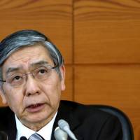 Bank of Japan Gov. Haruhiko Kuroda speaks during a news conference at the central bank\'s headquarters in Tokyo in mid-March. | BLOOMBERG