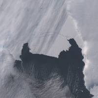 The B-31 Iceberg is seen before it separated from a rift in Antarctica\'s Pine Island Glacier in this NASA Earth Observatory handout image taken Oct. 28. Scientists are monitoring the unusually large iceberg, which is roughly six times the size of Manhattan and is heading into the open ocean. | REUTERS