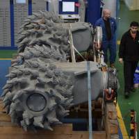 Components of a subsea mining machine are assembled by Soil Machine Dynamics at Wallsend, England, on April 14. | REUTERS