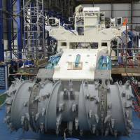 Employees of Soil Machine Dynamics work on a subsea mining machine being built for Nautilus Minerals at Wallsend, northeast England, on April 14. High-tech advances, depleted reserves of previously easy-to-reach onshore minerals and historically high prices have boosted the idea of mining the ocean\'s depths, where metals can be fifteen times the quality of land deposits. | REUTERS