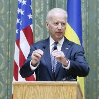 U.S. Vice President Joe Biden and Ukrainian Prime Minister Arseniy Yatsenyuk speak to reporters in Kiev on April 22. Weakened U.S. hand in Ukraine conflict