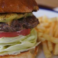 Authentic eats: The avocado cheeseburger at The Corner. | ADAM MILLER