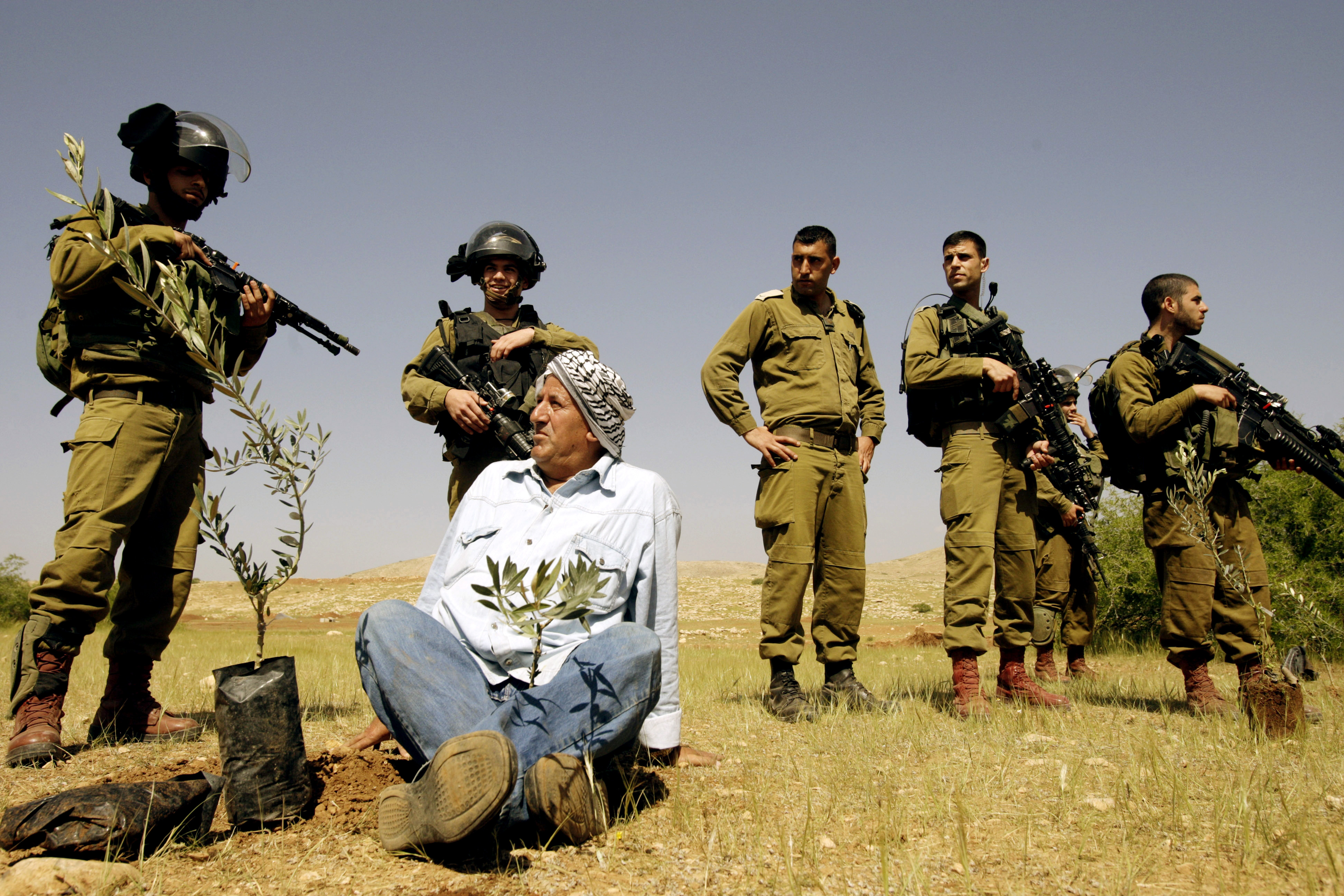 Image result for israel soldier palestinian farmer