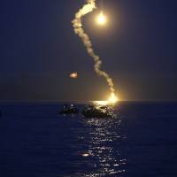 South Korean maritime police send up flares to search for missing passengers Wednesday night from the sinking of the ferry Sewol off Jindo. Almost 300 people were still missing Thursday morning after the ferry capsized off South Korea, in what could turn out to be the country\'s biggest maritime disaster in over 20 years. | REUTERS