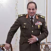 Egyptian army chief Abdel Fattah al-Sisi arrives for a meeting with Russian President in Novo-Ogaryovo, outside Moscow, on Feb. 13. | AFP-JIJI