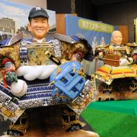 \"Gogatsu ningyo\" samurai warrior dolls modeled on New York Yankees pitcher Masahiro Tanaka and Tokyo Gov. Yoichi Masuzoe are shown to the media Thursday at maker Kyugetsu Co.\'s showroom in Taito Ward, Tokyo, ahead of Children\'s Day on May 5. | SATOKO KAWASAKI