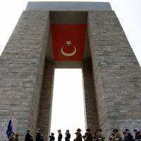 Australian and New Zealand soldiers gather Thursday at the Canakkale Martyrs Memorial in western Turkey for a service marking the 99th anniversary of the ANZAC Gallipoli Campaign, which claimed over 100,000 lives, during World War I. | REUTERS