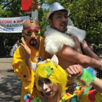 Participants at Tokyo Rainbow Pride 2014, held to support LGBT rights, celebrate Sunday in Tokyo\'s Yoyogi Park. | SANG WOO KIM