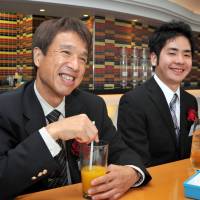 Academic push: Masaya Nakamura (left) and Shotaro Iwata were this year\'s recipients of CWAJ scholarships for the visually impaired. | YOSHIAKI MIURA