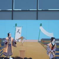 Past masters: The kabuki actors Onoe Matsuya (far left) and Nakamura Shichinosuke during their outdoor performance of \"Dango-Uri\" (\"The Dumpling Sellers\") at Tokyo Skytree. | LINDSAY NELSON
