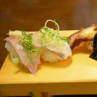 Sea bites: Aji (mackerel) sushi and octopus tentacles at Nanaezushi.  | J.J. O\'DONOGHUE