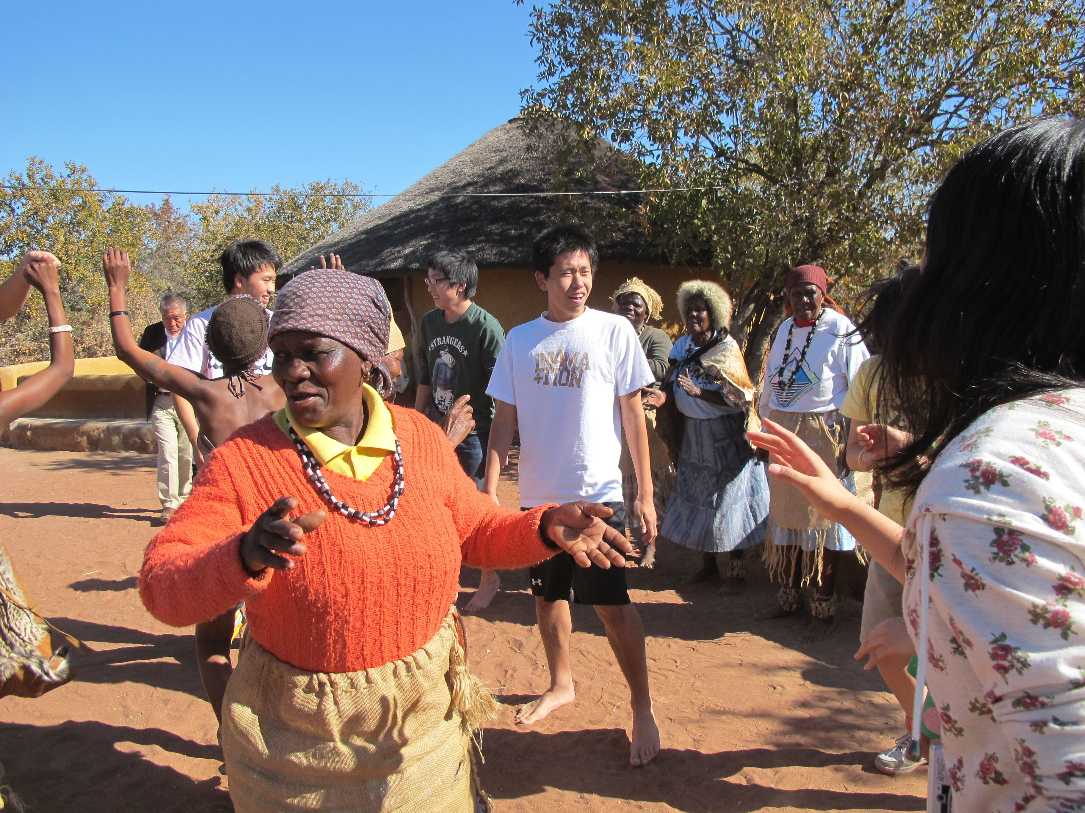 Cultivating a global outlook: Tamagawa Gakuen students experience Tswana culture on their African studies tour in Botswana. More than 100 students have been through the program since it began in 2009. | &#169;TAMAGAWA ACADEMY
