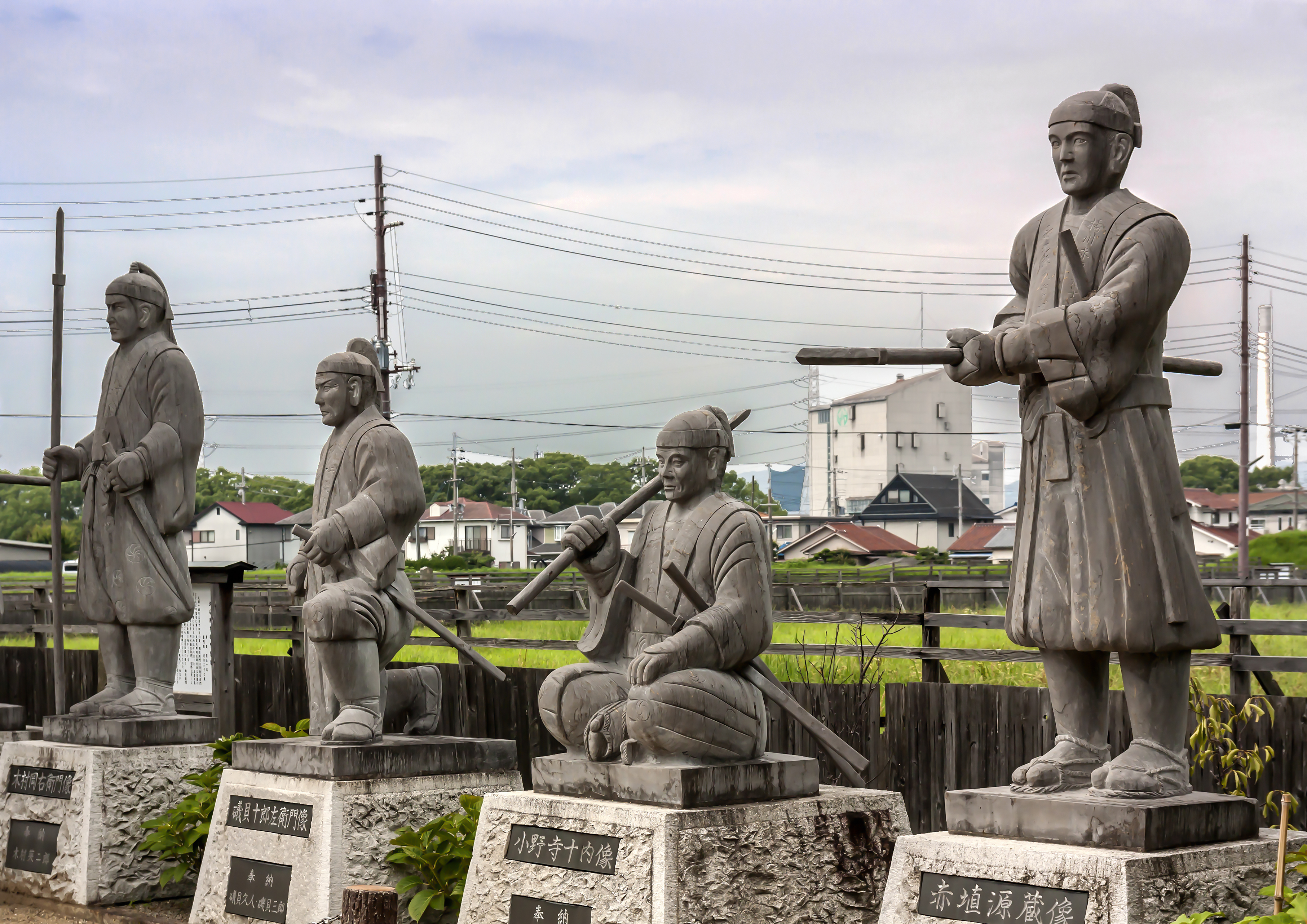 Stone statues of the 47 ronin line the entrance to Oishi Shrine in Ako. | ALON ADIKA