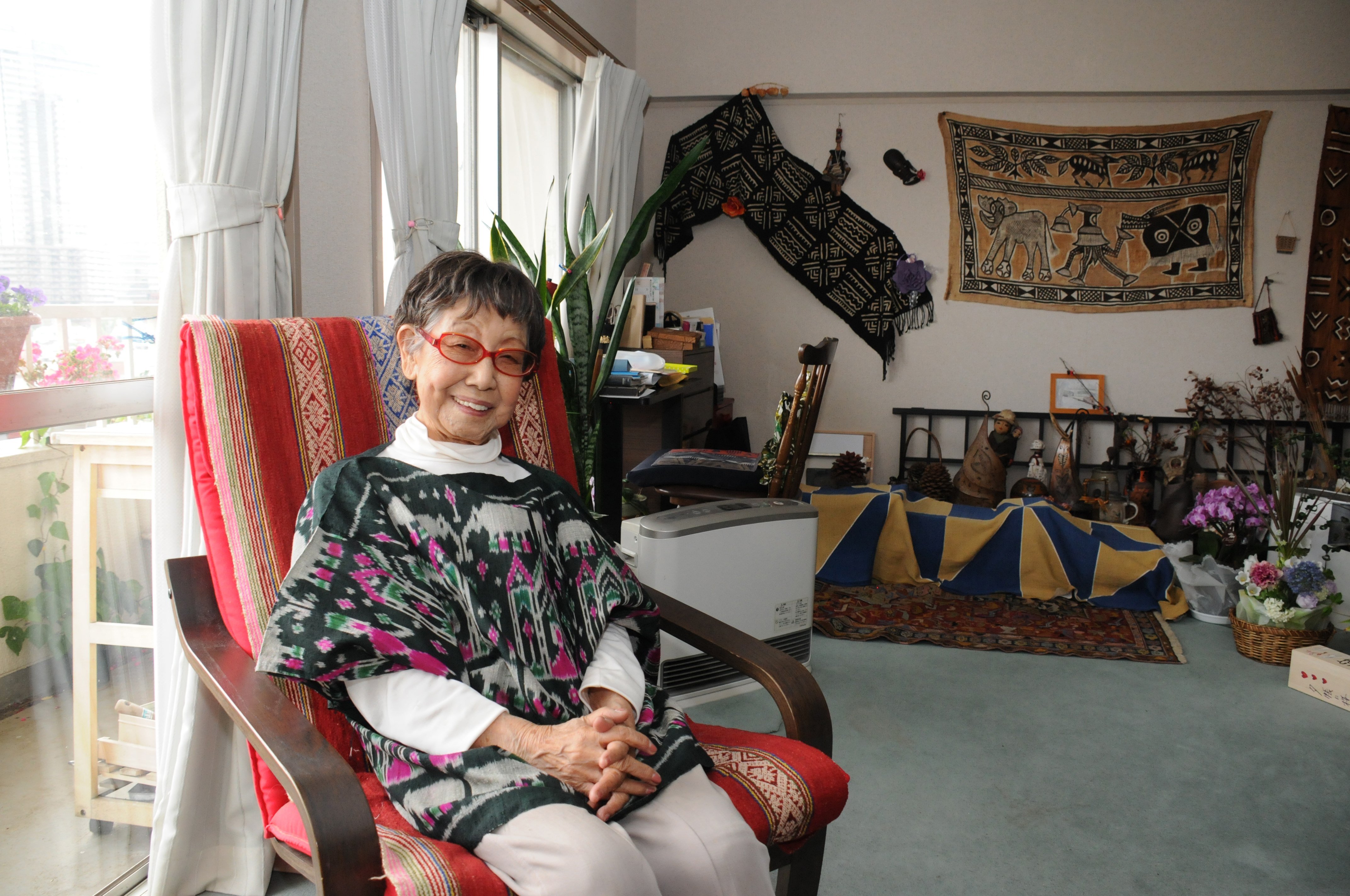 Photojournalist Tsuneko Sasamoto, who turns 100 in September, is interviewed at her home in Shibuya Ward, Tokyo, on April 28. | SATOKO KAWASAKI