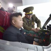 North Korean leader Kim Jong Un inspects an air and anti-air force unit of the Korean People\'s Army in this undated photo released by the official Korean Central News Agency on Wednesday. | REUTERS