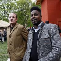 Artists Lars Cuznor (left) and Mohamed Ali Fadlabi attend Thursday\'s opening in Oslo of their re-creation of the Congo Village a hundred years ago, in which blacks were put on display in a \"human zoo.\" | AP
