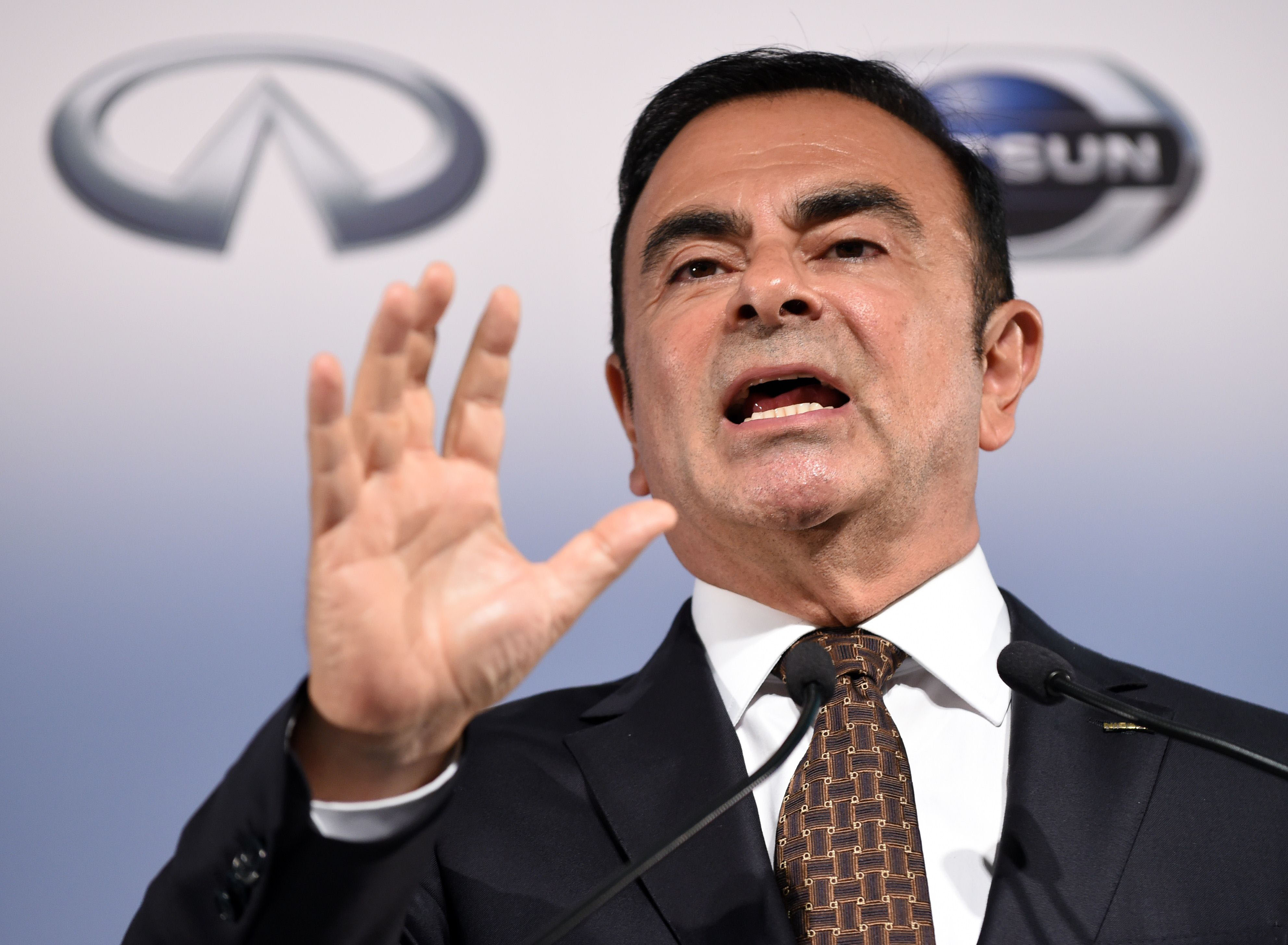 Nissan Chairman and CEO Carlos Ghosn announces the automaker's financial results for the year to March 31 in Yokohama on Monday. | AFP-JIJI
