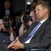 Alexey Miller, CEO of Russian energy giant Gazprom, attends a news conference as part of a meeting with European Union Energy Commissioner Guenther Oettinger and the Russian and Ukrainian energy ministers in Berlin on Monday. | AP