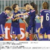 Wonderful feeling: Nadeshiko Japan players celebrate an extra-time 2-1 victory over China in the Women\'s Asian Cup on Thursday in Ho Chi Minh City. | KYODO