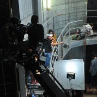 Master at work: Director Hideo Nakata on the set of \"Monsterz,\" his new psychological thriller. | &#169; 2014 \"MONSTERZ\" FILM PARTNERS