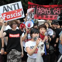 There was no shortage of bullhorns at this evening\'s demo in front of Prime Minister Shinzo Abe\'s office.  | YOSHIAKI MIURA