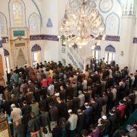 A piece of home: The multinational congregation at the Tokyo Camii attends Friday prayer. | COURTESY OF TOKYO CAMII