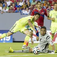 National service: Shinji Kagawa scored in Japan\'s 3-1 win over Costa Rica on Monday after failing to notch a single goal last season with Manchester United. | AFP-JIJI