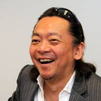 Tetsuya Ando, founder of Fathering Japan, is interviewed in Tokyo’s Minato Ward on May 19. NPO Fathering Japan shows men how to be better dads