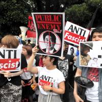 Thousands of activists stage a protest against collective self-defense in front of the prime minister\'s office in Tokyo on Monday. | YOSHIAKI MIURA