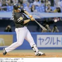 The start of something big: Hawks slugger Lee Dae-ho hits a solo home run in the third inning to break a scoreless tie against the Swallows on Thursday at Jingu Stadium. Fukuoka Softbank routed Tokyo Yakult 7-2. | KYODO