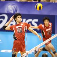 Staying aggressive: Japan’s Takashi Dekita spikes against Germany during Sunday’s FIVB World League Pool D match in Koshigaya, Saitama Prefecture. Japan defeated Germany in five sets. Japan volleyball squad wraps up World League campaign with first victory