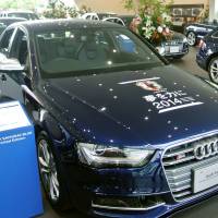 Audi Japan KK on Friday unveiled 11 limited-edition World Cup cars at a showroom in Izumisano, Osaka Prefecture, ahead of the 2014 World Cup in Brazil, which kicks off next week. The cars, sporting blue motifs borrowed from the Japan national team\'s uniform, are priced between &#165;6.71 million and &#165;13.84 million. | KYODO
