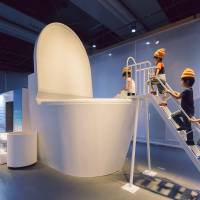 Kids get ready to be flushed down a giant toilet to experience a virtual sewage system | KYODO
