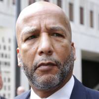 Former New Orleans Mayor Ray Nagin leaves court after being sentenced to 10 years in New Orleans on Wednesday. | REUTERS