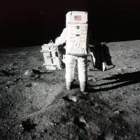 Edwin \"Buzz\" Aldrin carries scientific experiments to a deployment site south of the lunar module Eagle during the Apollo 11 mission in this July 20, 1969, photo provided by NASA. | AP