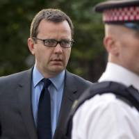 Former editor of the News of the World Andy Coulson arrives at the Old Bailey courthouse in Londonn on Monday. British Prime Minister David Cameron\'s ex-media chief Coulson will face a re-trial over whether he sanctioned illegal payments to a public official while editing a Rupert Murdoch tabloid, prosecutors said Monday.  | REUTERS