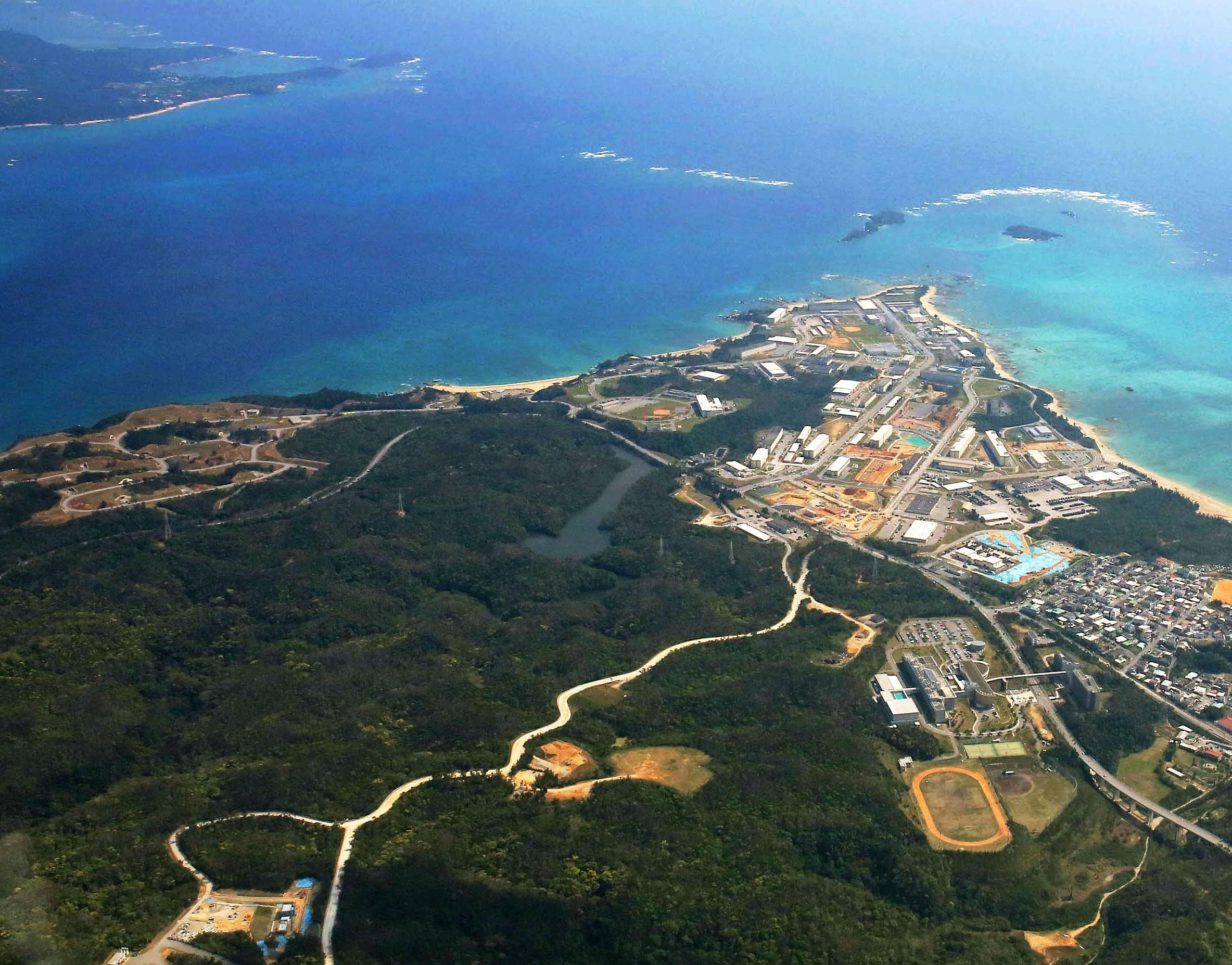 An aerial photo taken in February shows the Henoko district of Nago, Okinawa Prefecture, where U.S. Marine Corps Air Station Futenma will be relocated. | KYODO